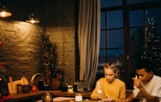 holidays as a divorced parent, photo of kids at thanksgiving sitting at a table