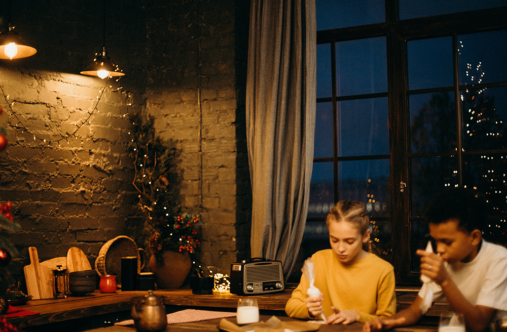 holidays as a divorced parent, photo of kids at thanksgiving sitting at a table